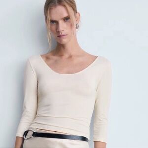 Mango Women's Ivory Top. Sz fits M/L; Mango tag is XL. Stretch Very slim fit.